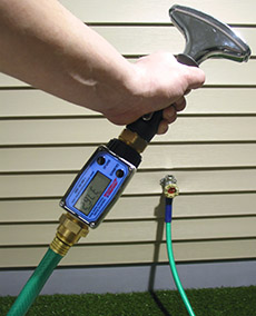 A1 Digital Water Meter between garden hose and nozzle