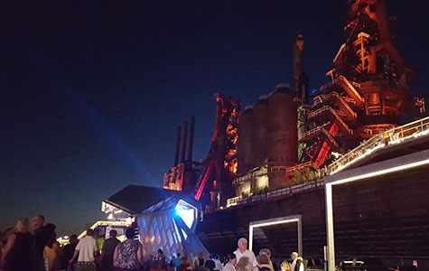 A concert is taking place at the Levitt Pavilion right in front of the Bethlehem Steel Blast Furnaces